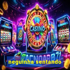 neguinha sentando